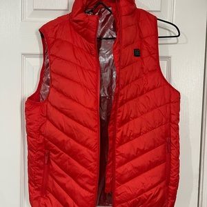 Red women’s HEATED puffer vest .